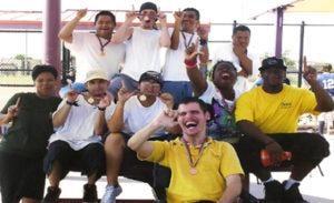 Group celebrating outdoors at a pavilion